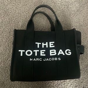 Marc Jacob’s “The Tote Bag” mini in black with strap
